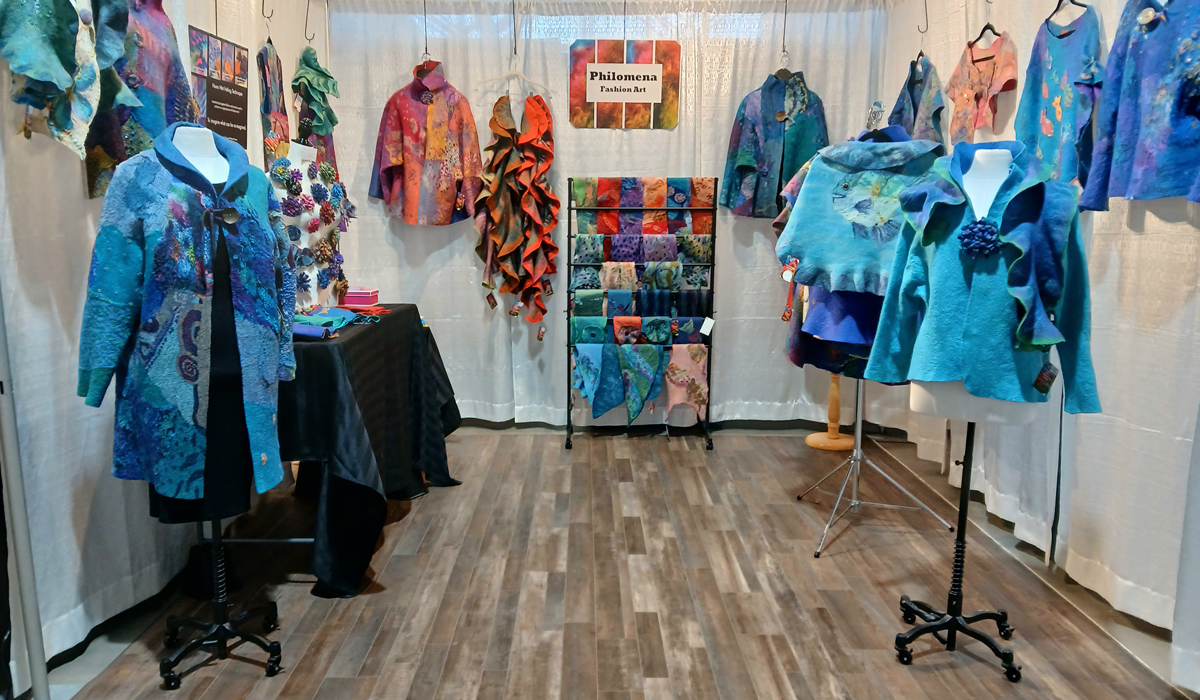 Philomena Fashion Art - photo of vendor booth at a marketplace