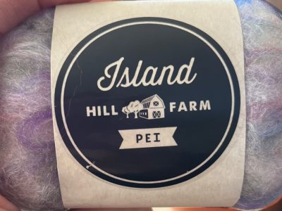 Island Hill Farm, skein of yarn with logo branding