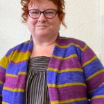 Kim McBrien-Evans wearing a set-in sleeve sweater