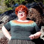 Kim McBrien-Evans wearing a bright coloured sweater
