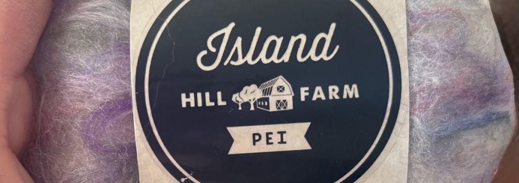 Island Hill Farm, skein of yarn with logo branding